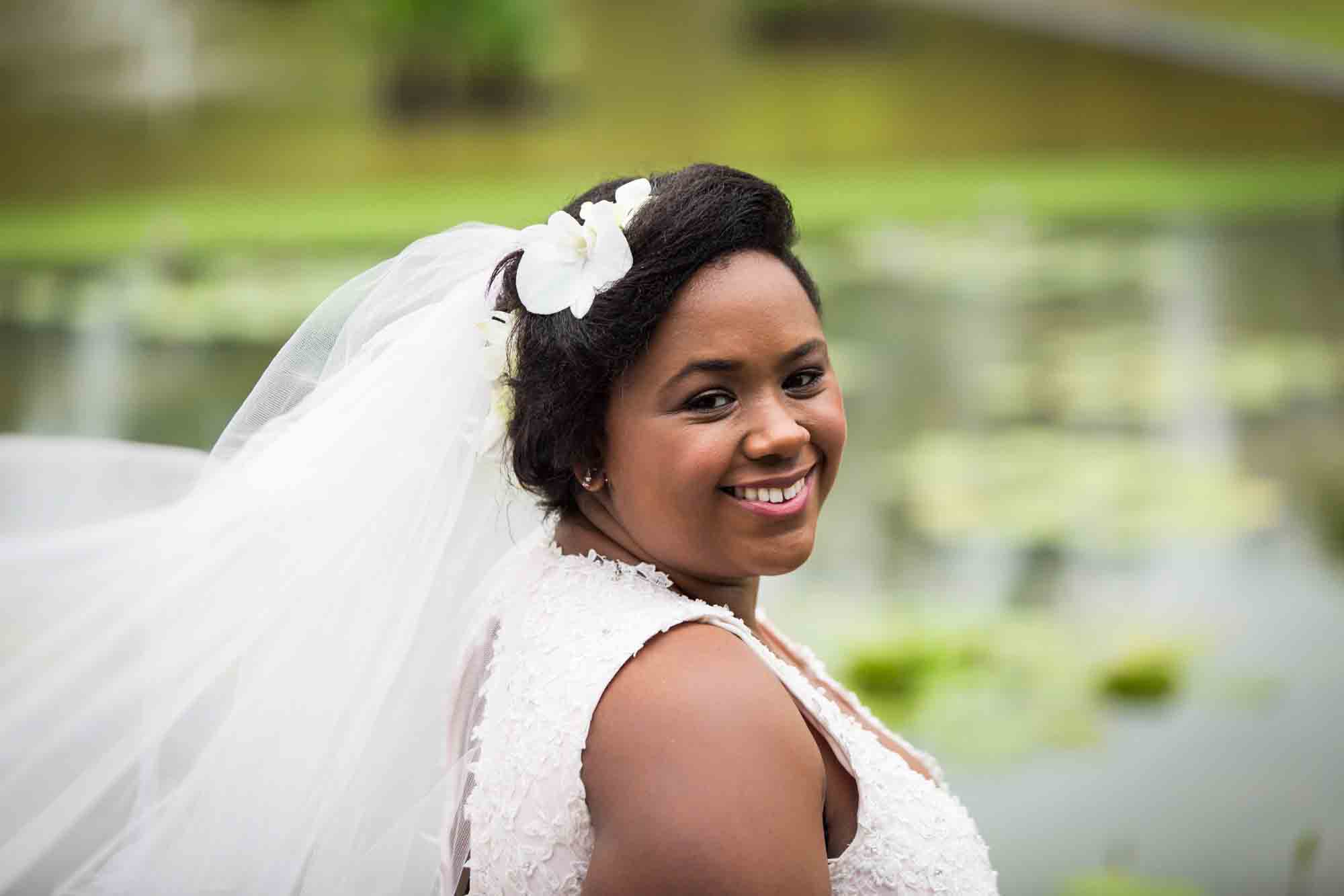 Bride with veil for an article on destination wedding planning tips