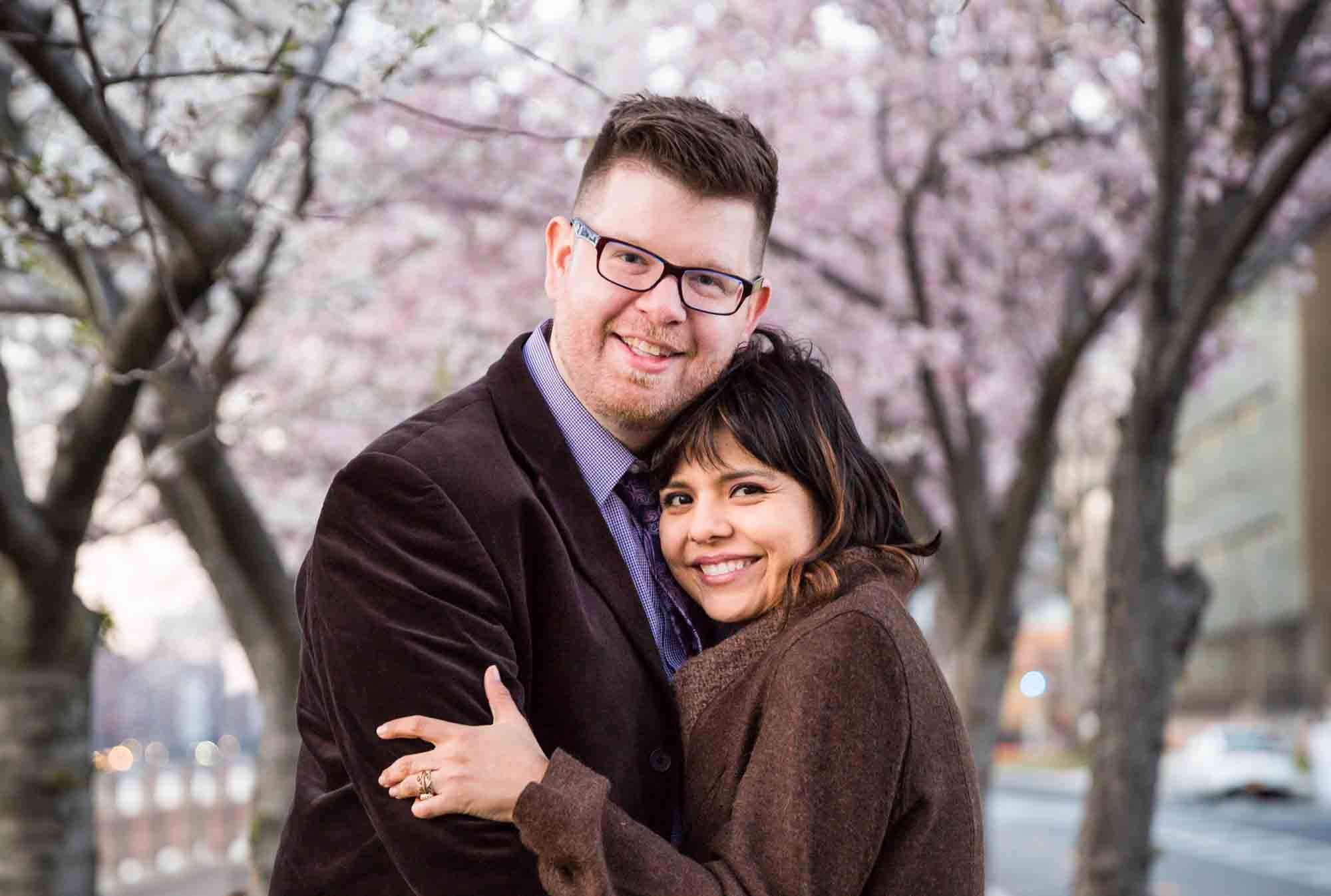 Roosevelt Island engagement portrait for an article on cherry blossom photo tips
