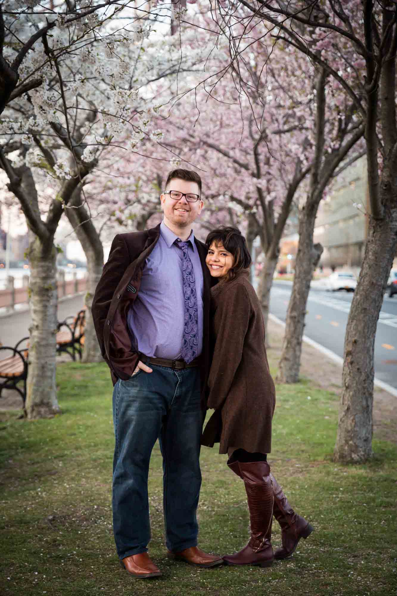 Roosevelt Island engagement portrait for an article on cherry blossom photo tips