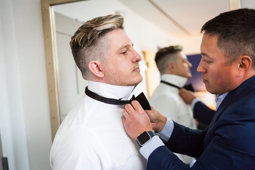 Grooms getting ready at a same sex wedding celebration in Washington DC