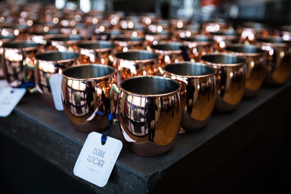 Moscow mule copper mug guest favors at a same sex wedding celebration in Washington DC
