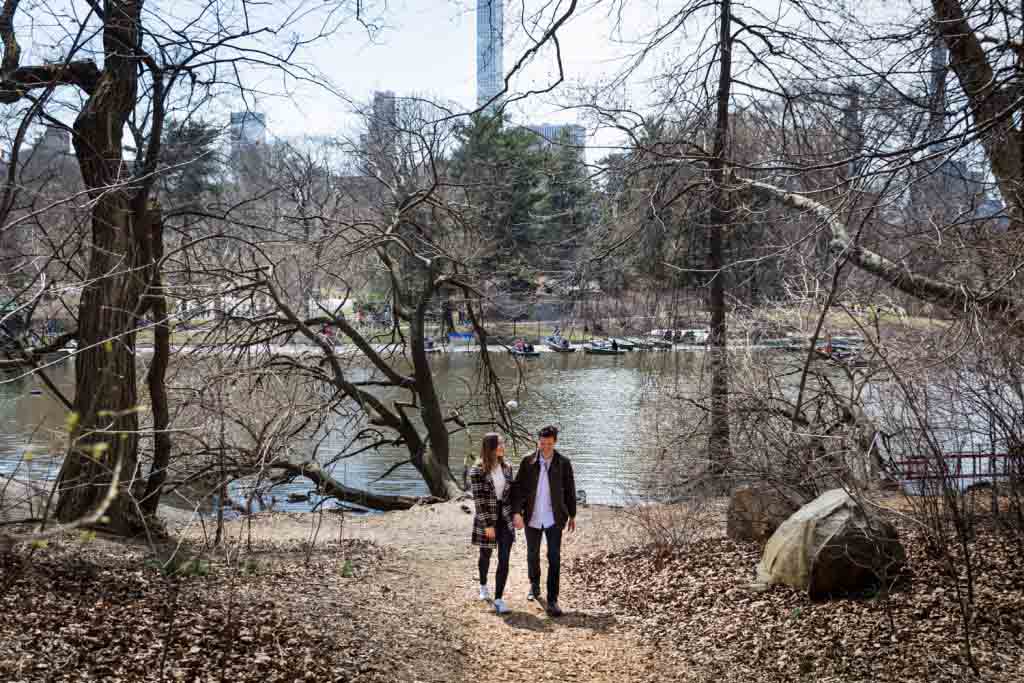 Man and woman walking in the Ramble for article on Central Park Lake proposal tips