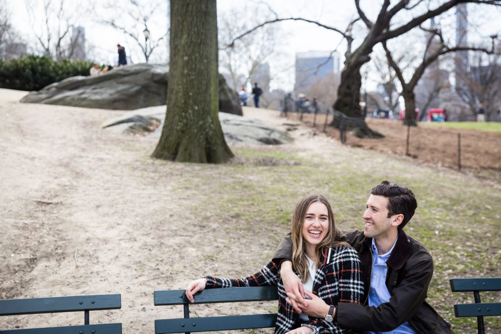 Couple sitting on bench in Central Park