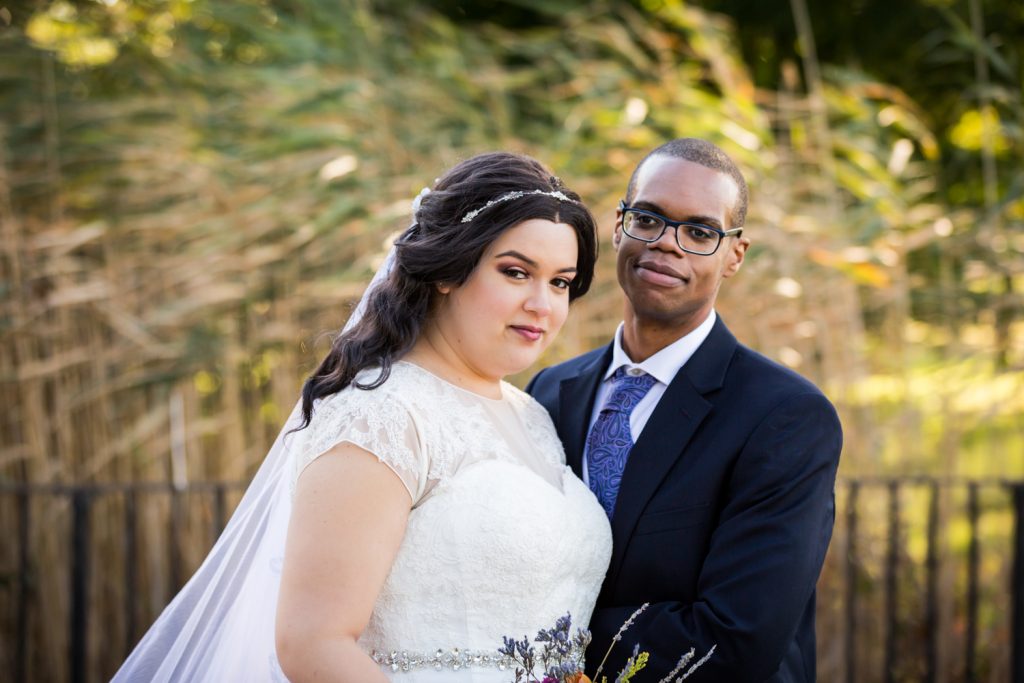 Portrait of bride and groom in Jamaica, Queens park