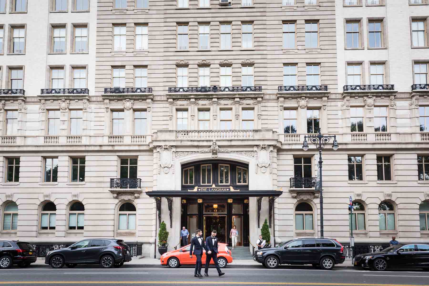 Two grooms in front of the Langham for an article entitled, ‘Do you need a permit to get married in Central Park?’