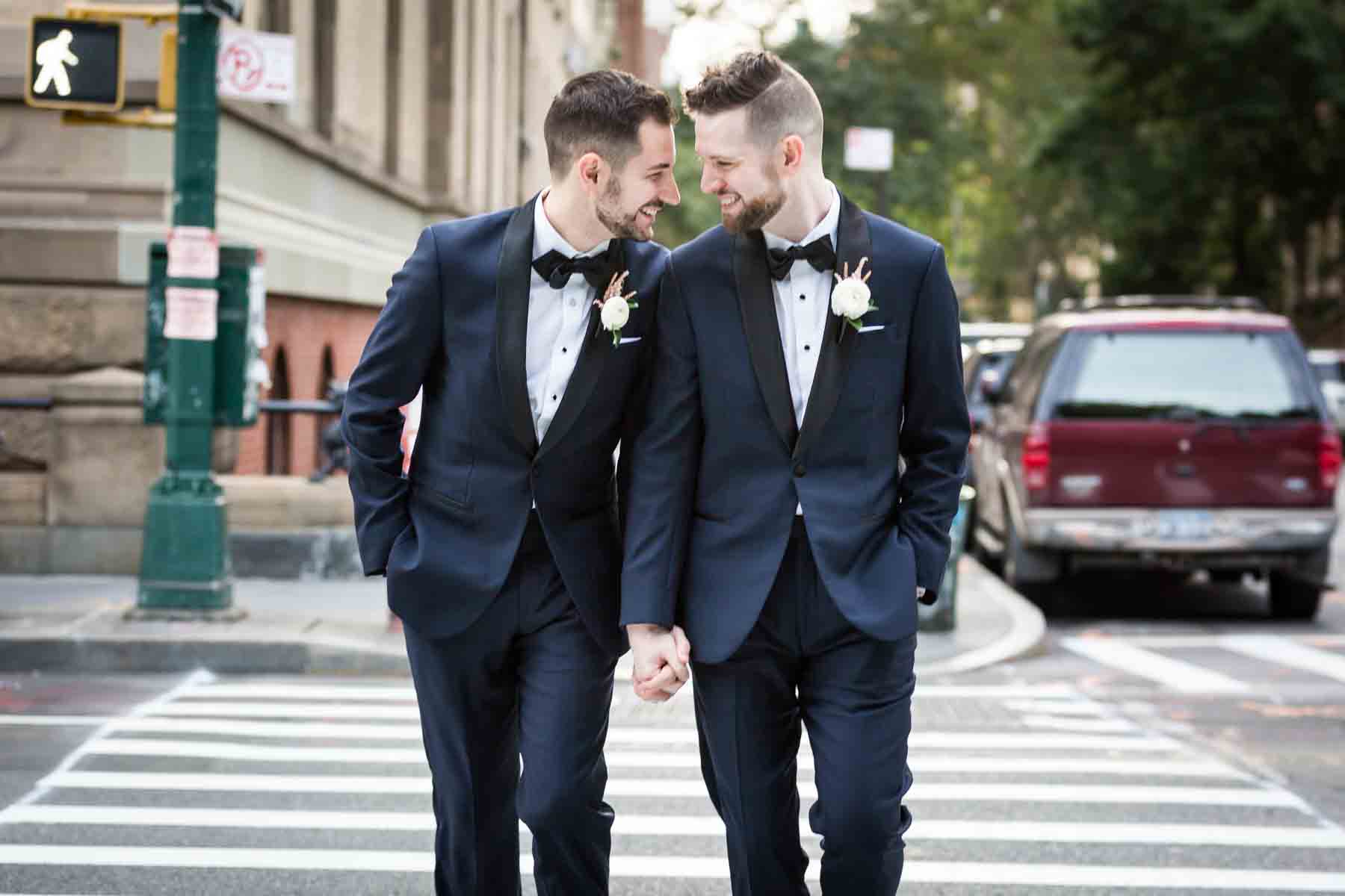 Two grooms in crosswalk for an article entitled, ‘Do you need a permit to get married in Central Park?’