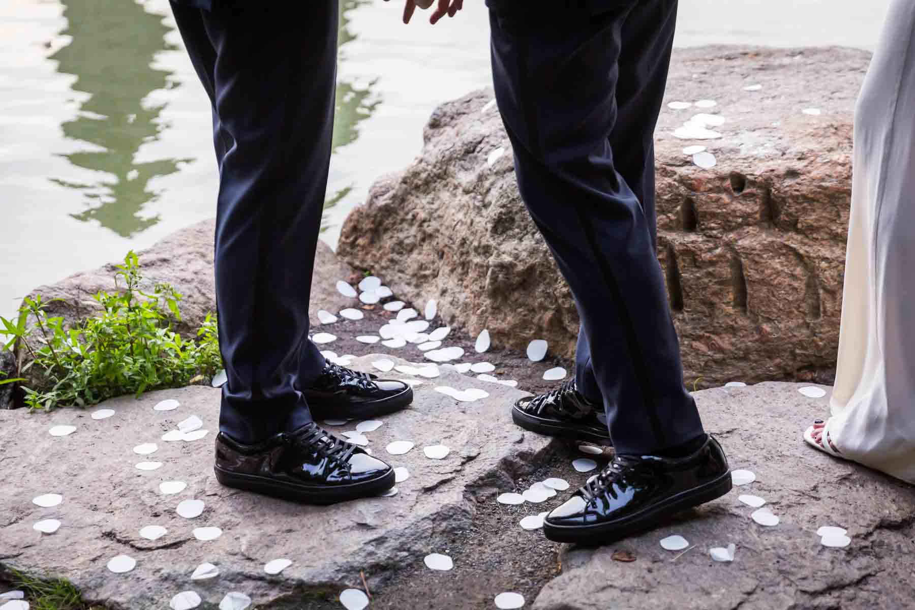 Grooms wearing matching patent leather shoes for an article entitled, ‘Do you need a permit to get married in Central Park?’