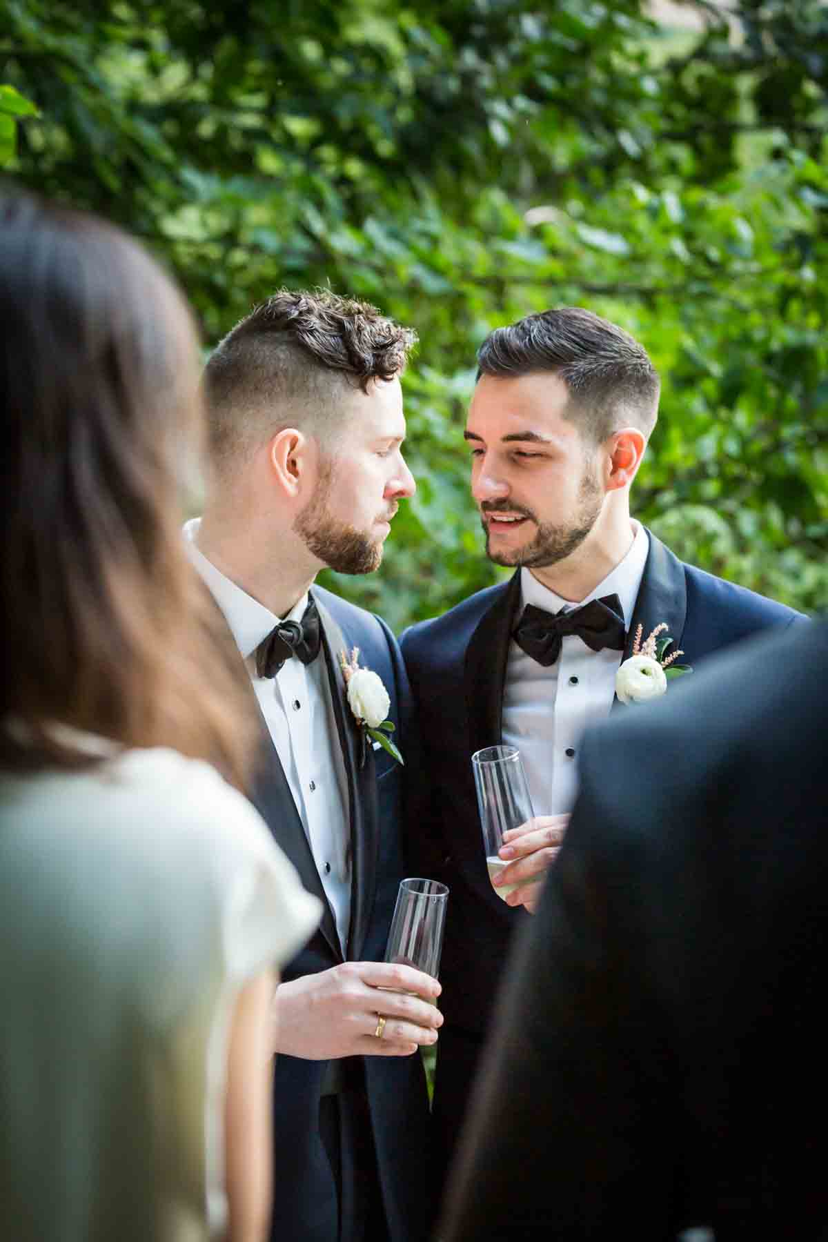Two grooms giving toast for an article entitled, ‘Do you need a permit to get married in Central Park?’