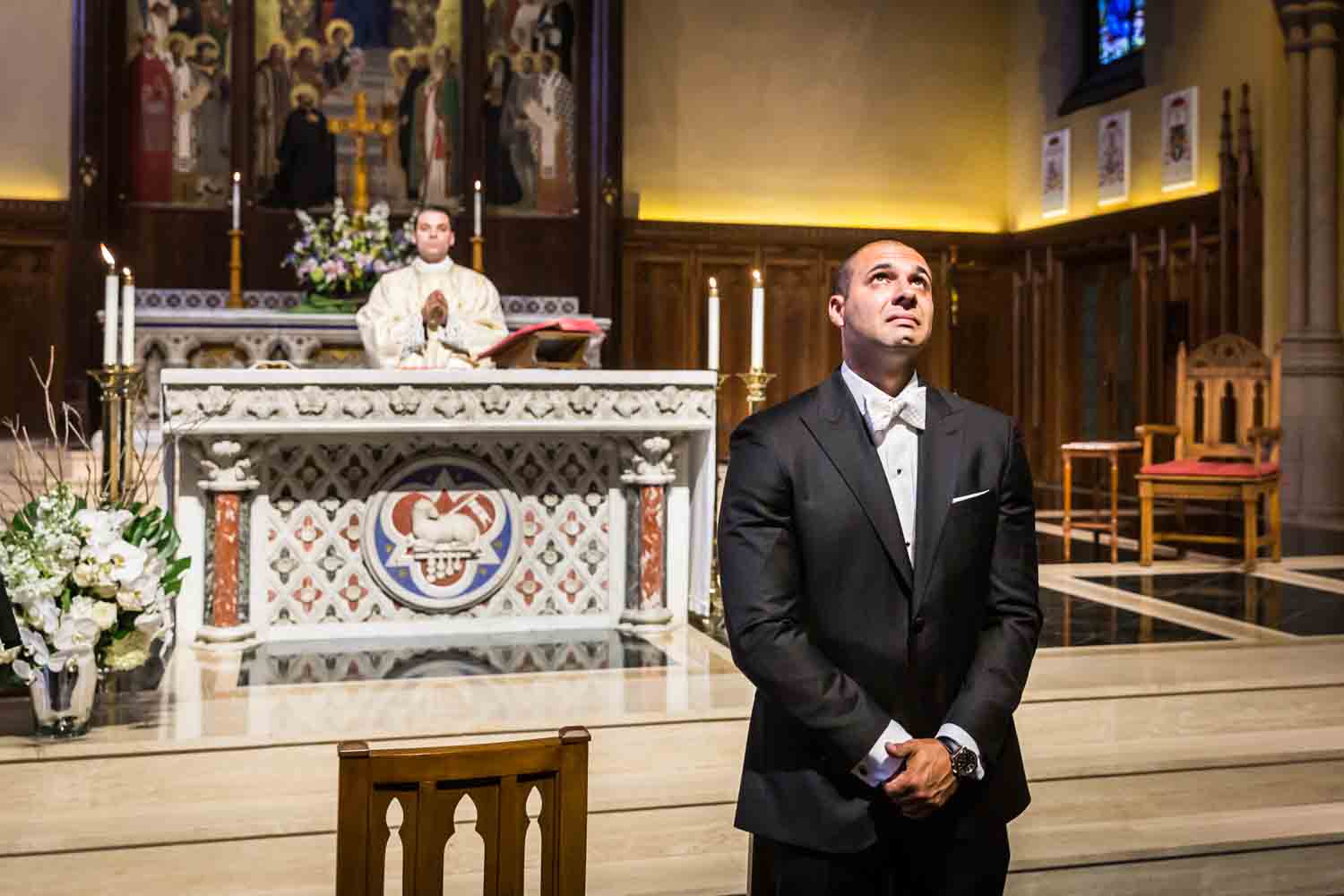 Groom trying not to cry for an article on Bronx Zoo wedding venue updates