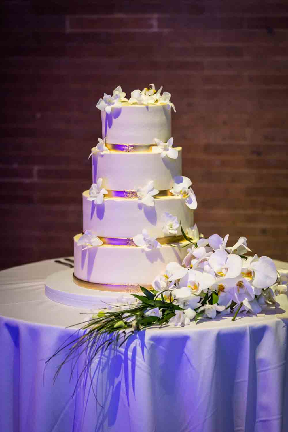 Wedding cake with flowers for an article on Bronx Zoo wedding venue updates