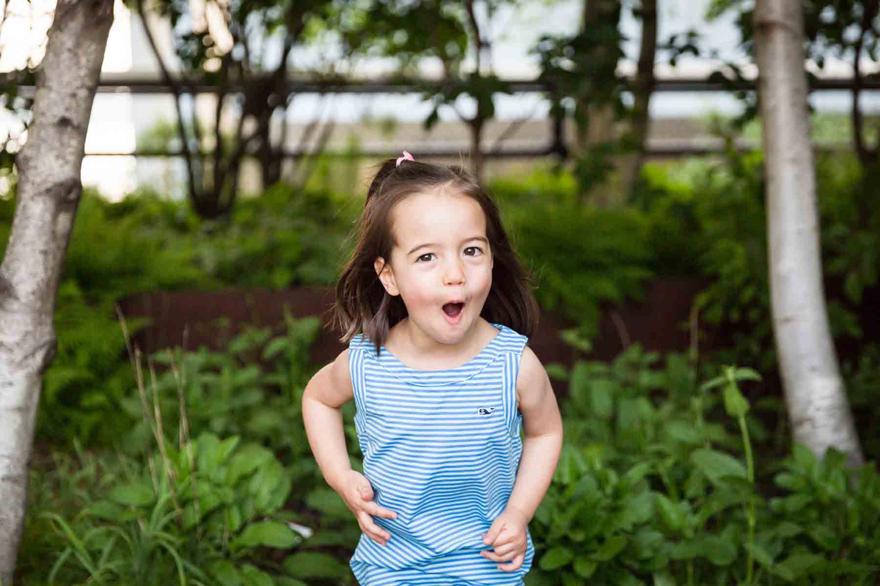 Little girl posing for an article on High Line family portrait tips