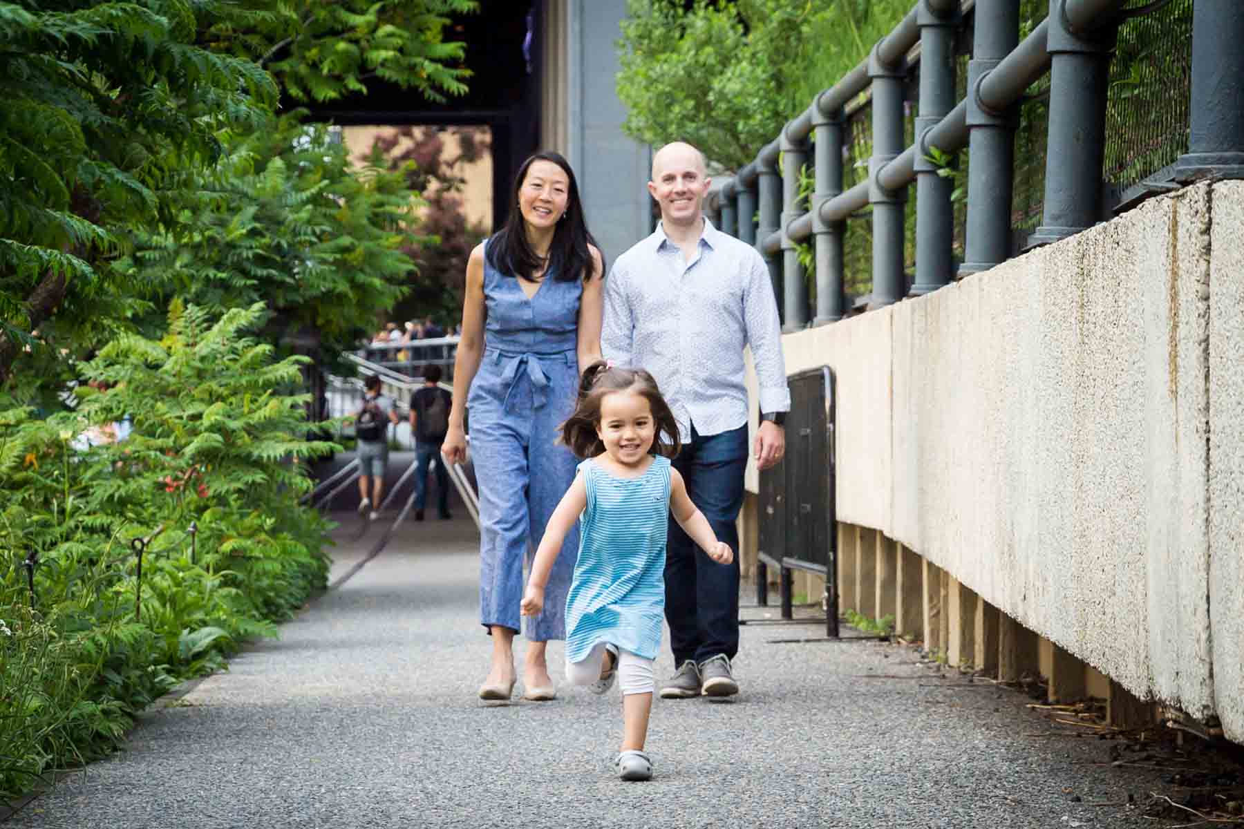 Little girl running for an article on High Line family portrait tips