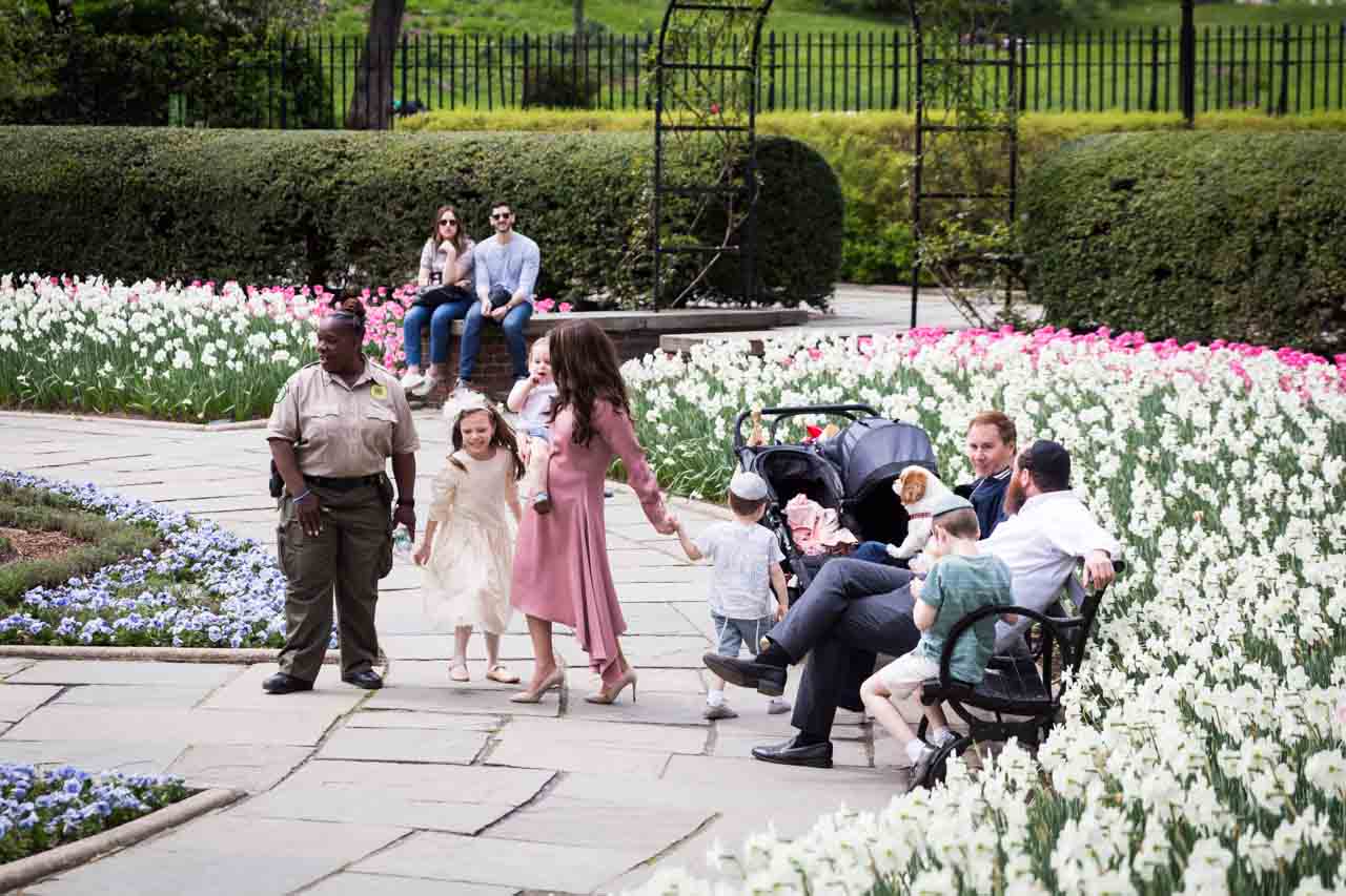 Central Park Conservatory Garden visitors and security guard