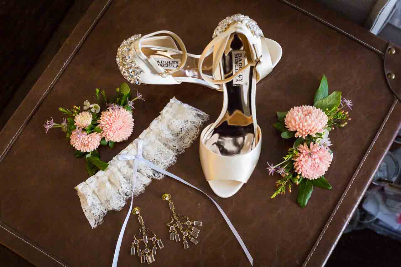 Bride's shoes and accessories at a Central Park Conservatory Garden wedding