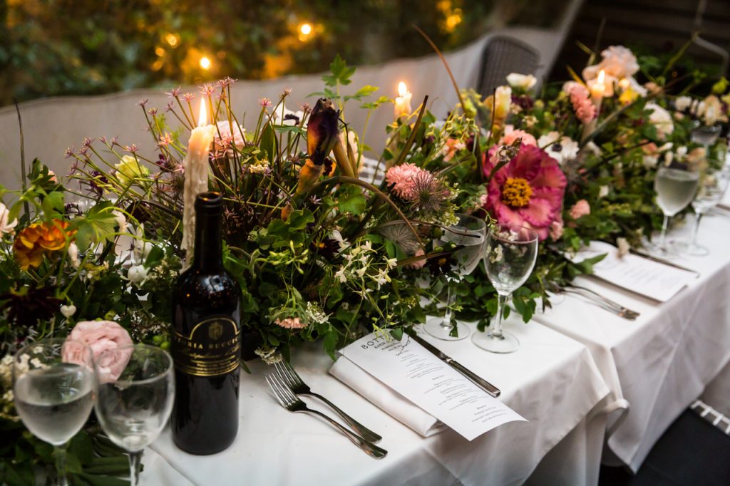 Detail of floral centerpieces at a Central Park Conservatory Garden wedding