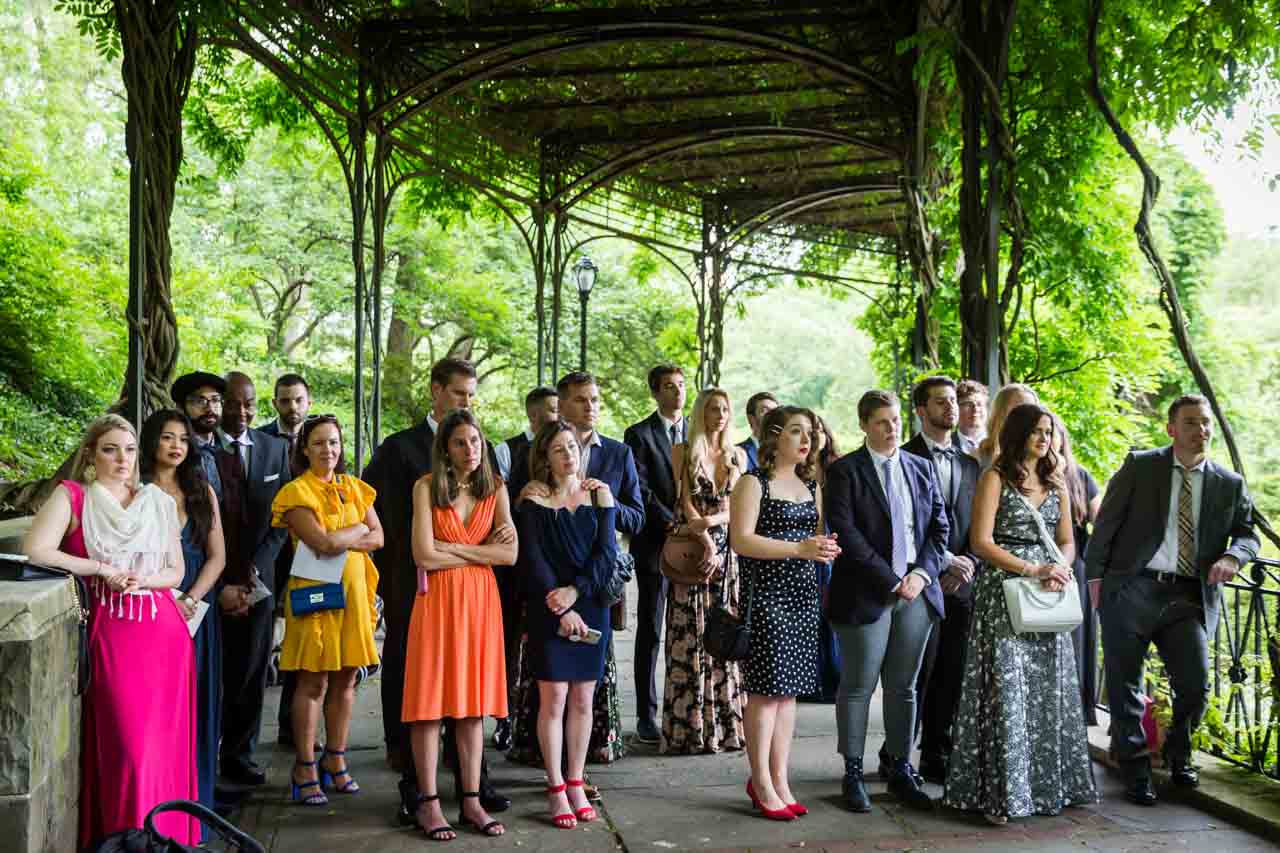 Guests standing at a Central Park Conservatory Garden wedding