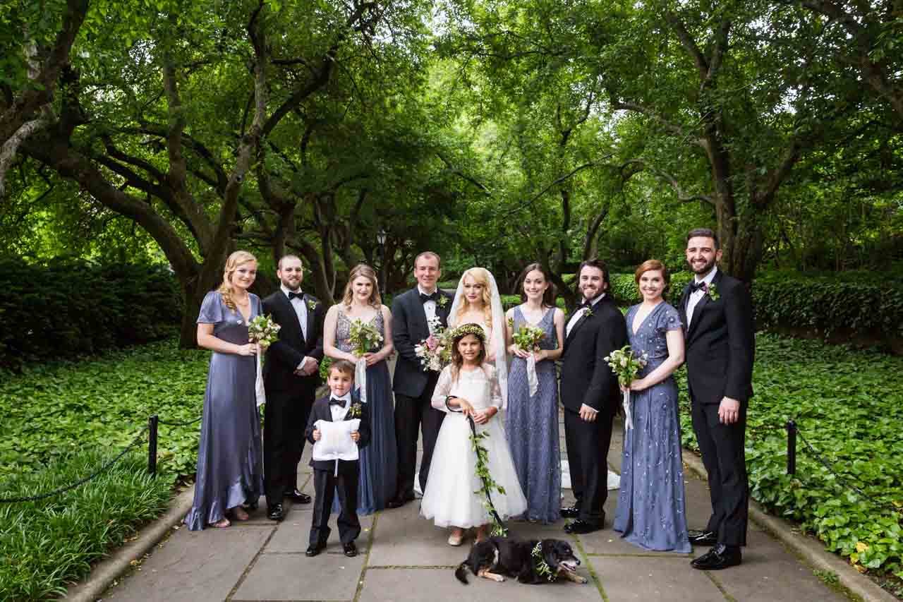 Bridal party portrait on walkway at a Central Park Conservatory Garden wedding