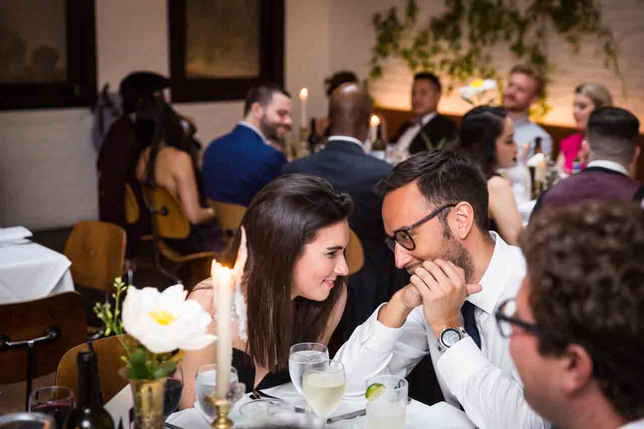 Guests cuddling at a Central Park Conservatory Garden wedding