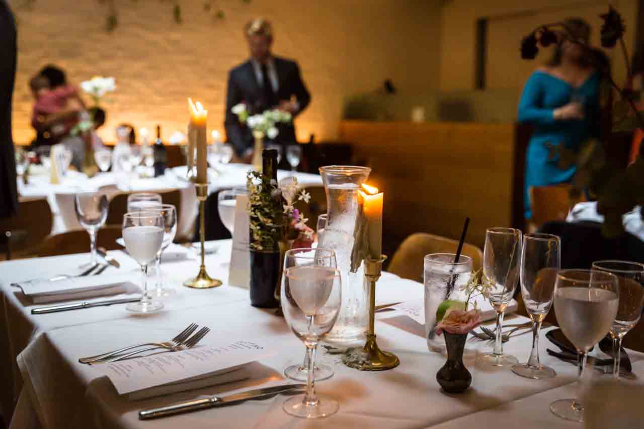 Wedding reception table setting for an article on non-floral centerpiece ideas