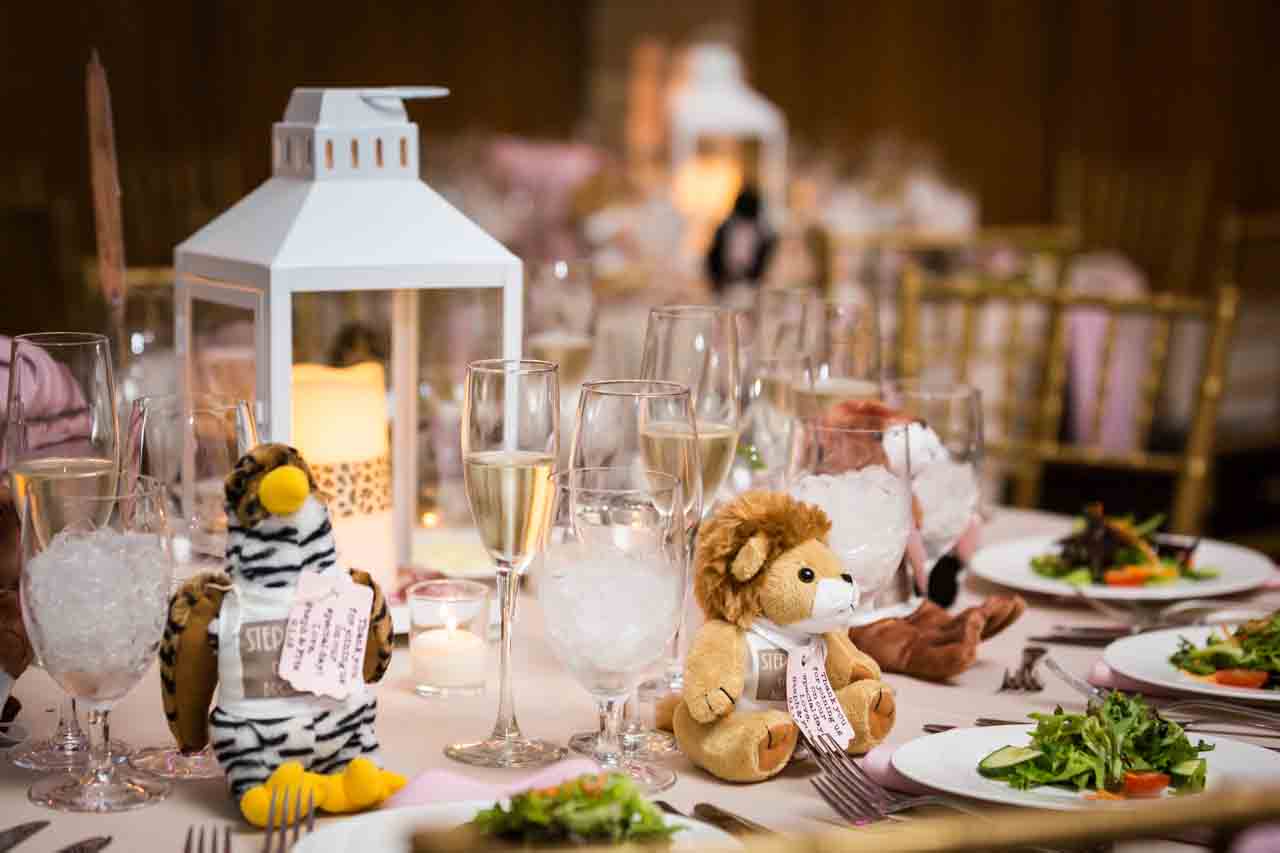 Table setting with stuffed animals for an article on non-floral centerpiece ideas