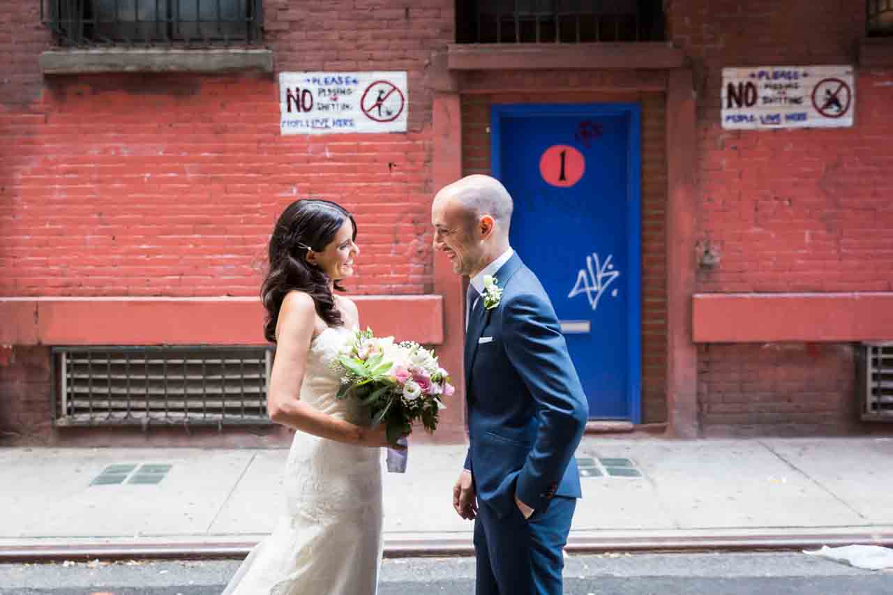 Bride and groom in Soho alleyway for an article on non-floral centerpiece ideas