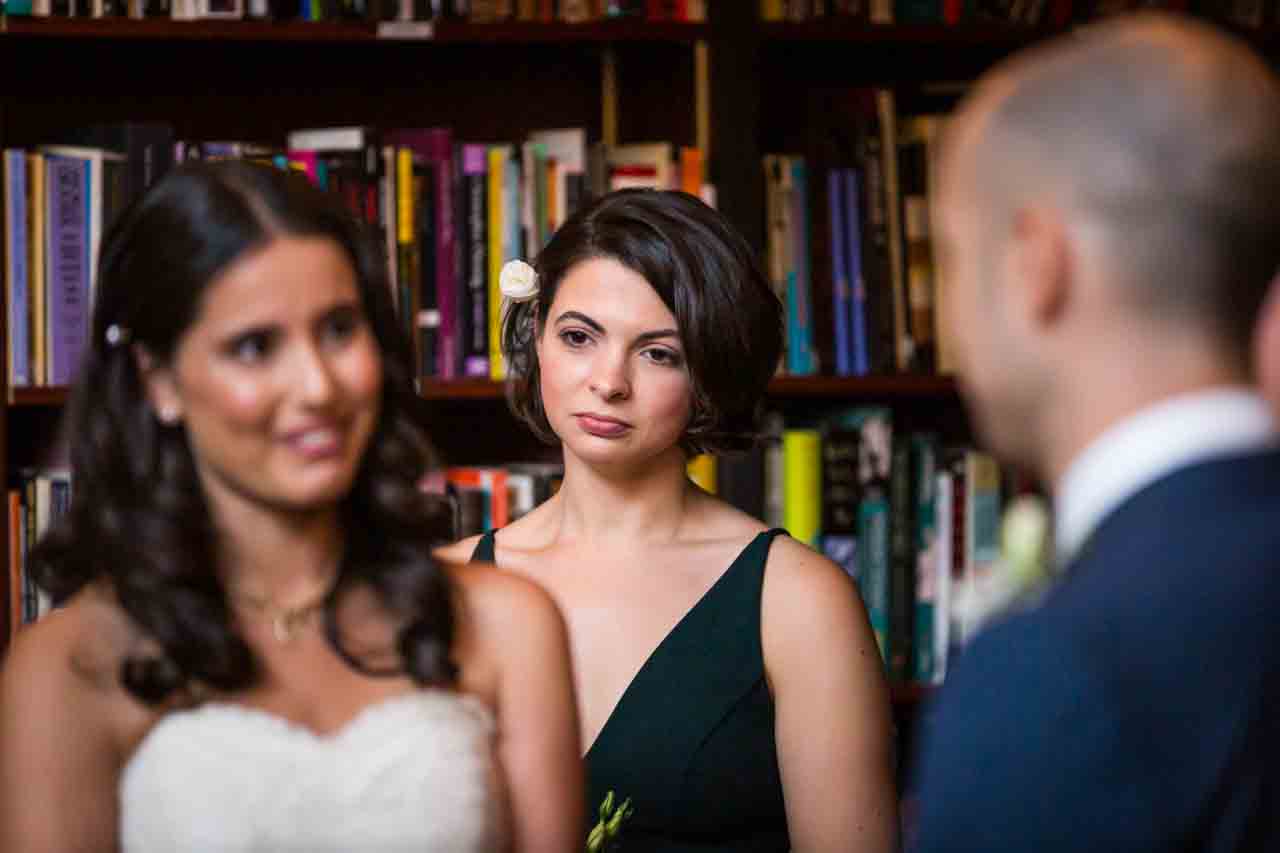 Bridesmaid watching couple for an article on non-floral centerpiece ideas