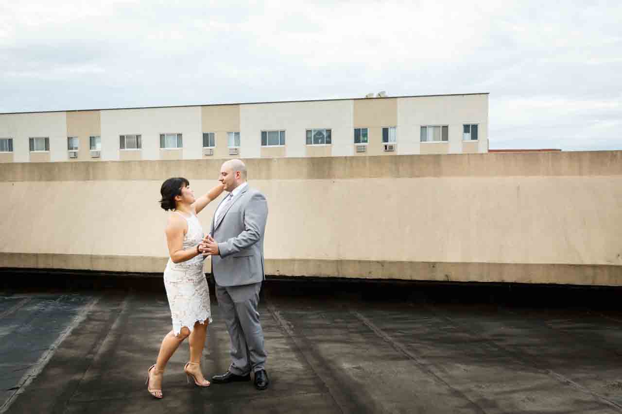 Bride and groom dancing on Dae Dong Manor roof