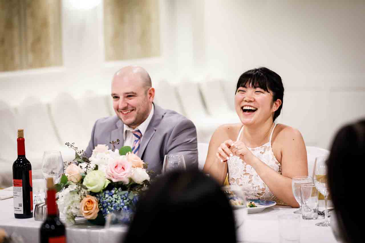 Bride and groom at reception after traditional Korean pyebaek ceremony