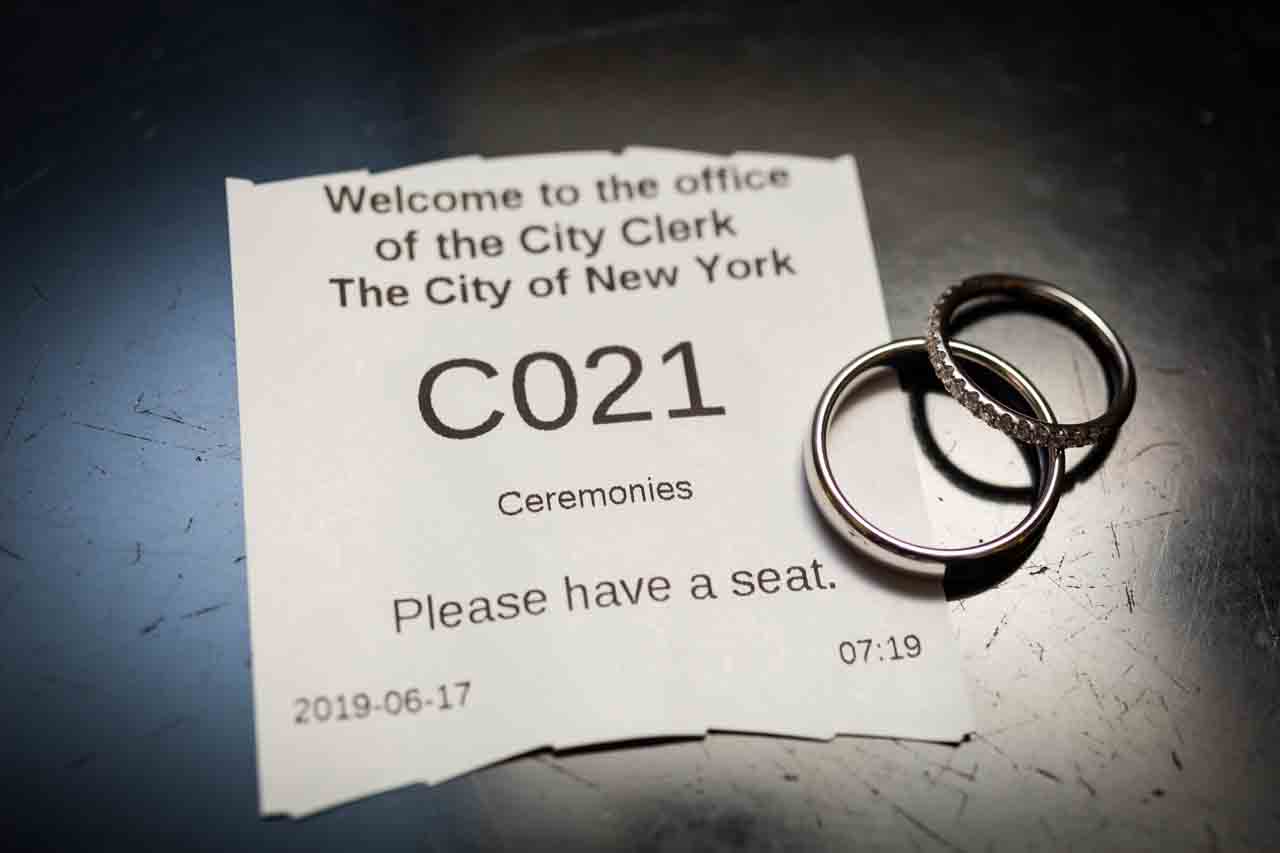 Wedding rings with City Clerk's Office waiting ticket