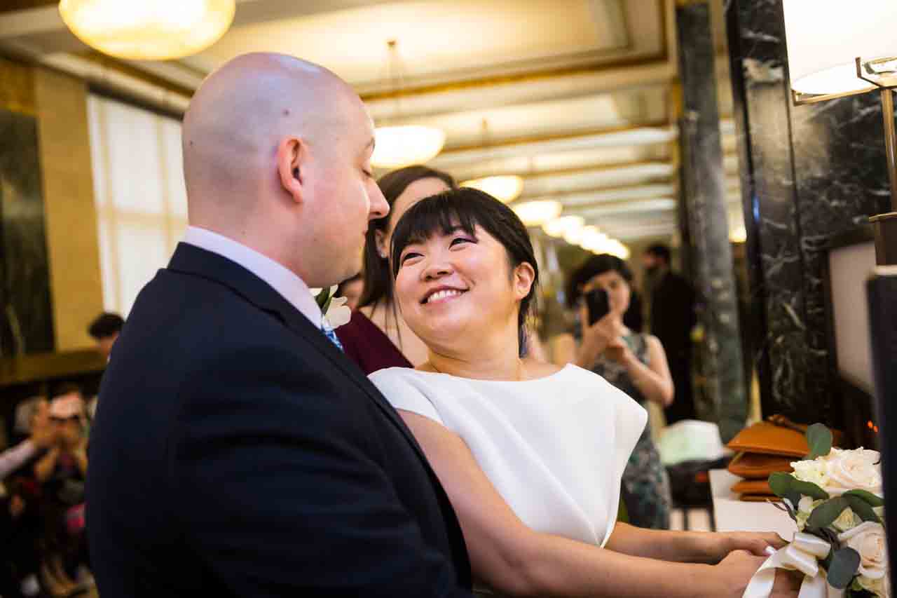 Bride and groom after signing City Hall wedding paperwork