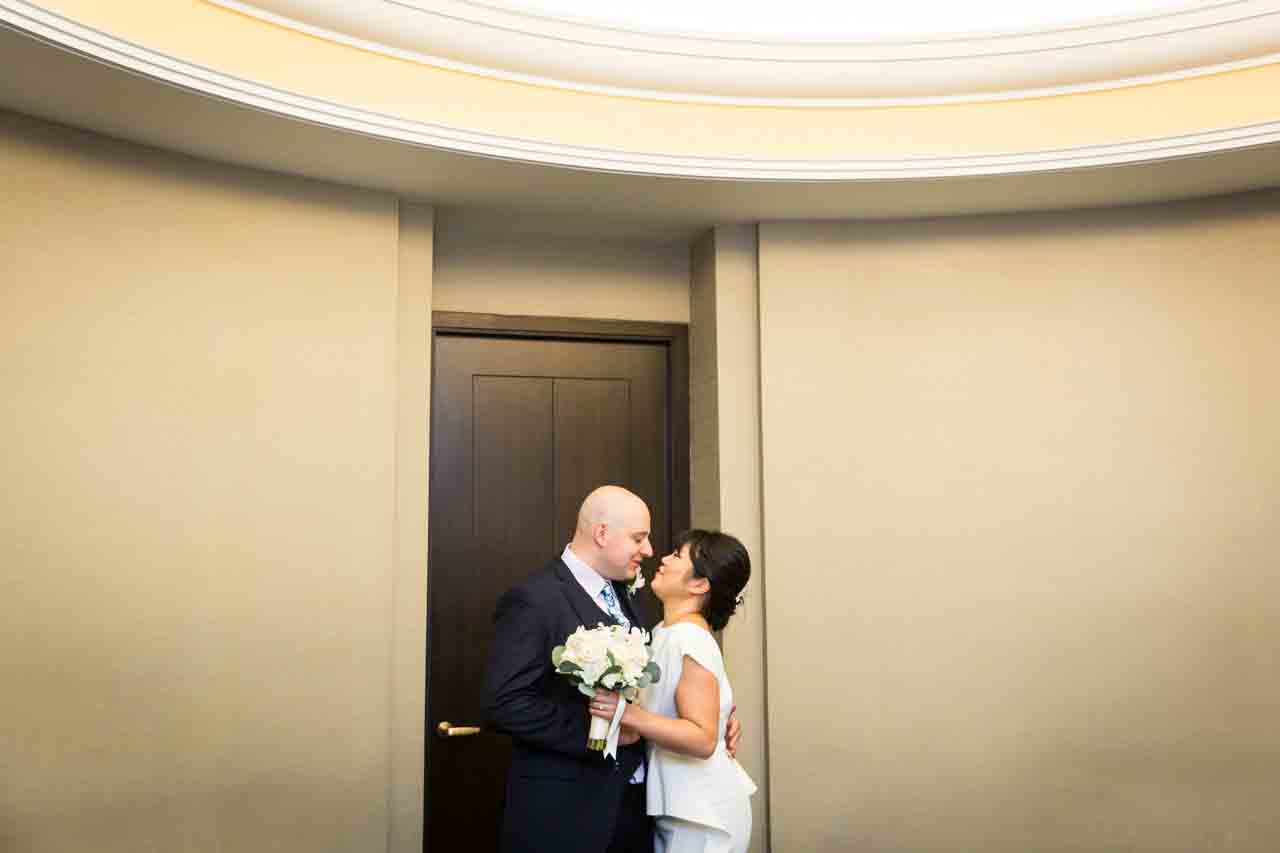 Bride and groom waiting for NYC City Hall wedding ceremony