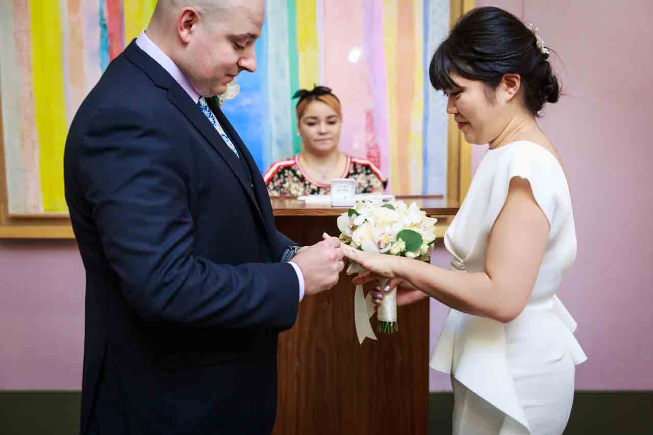 Exchange of rings at NYC City Hall wedding