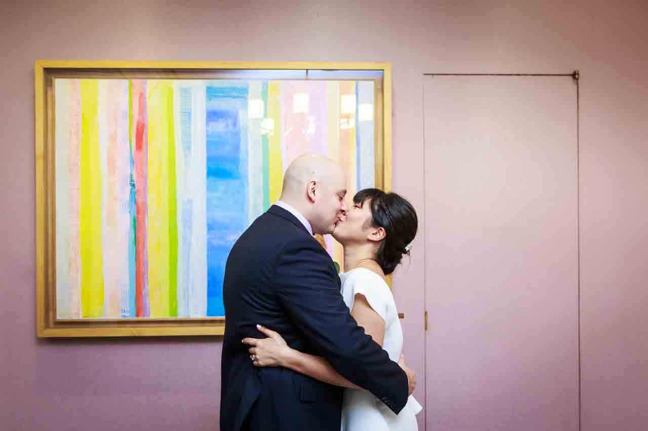 Bride and groom kissing at NYC City Hall wedding