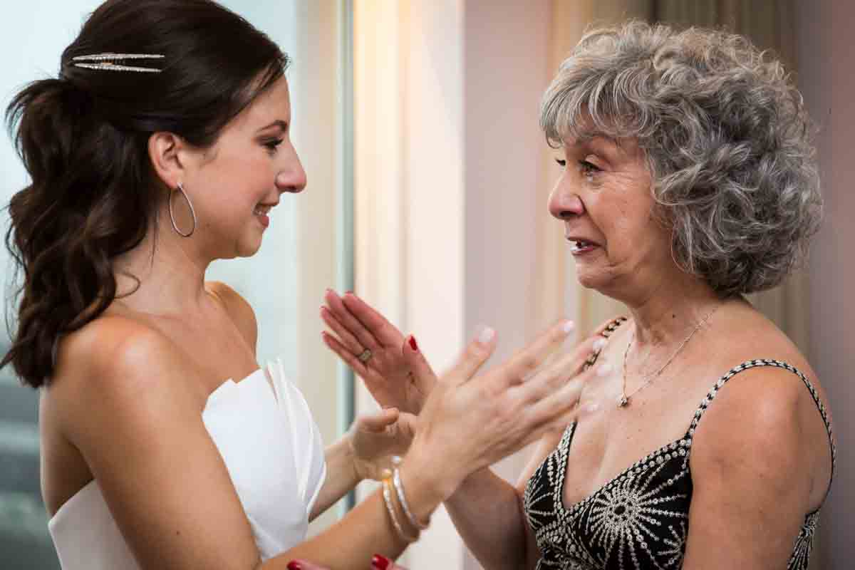 Bride and mother emotional before Four Seasons Hotel New York Downtown wedding