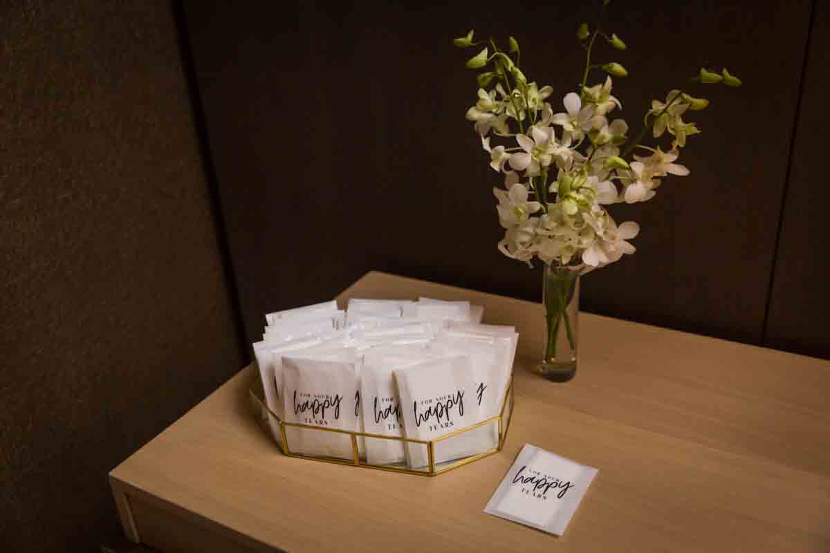 Cute tissue packets provided to guests at a Four Seasons Hotel New York Downtown wedding