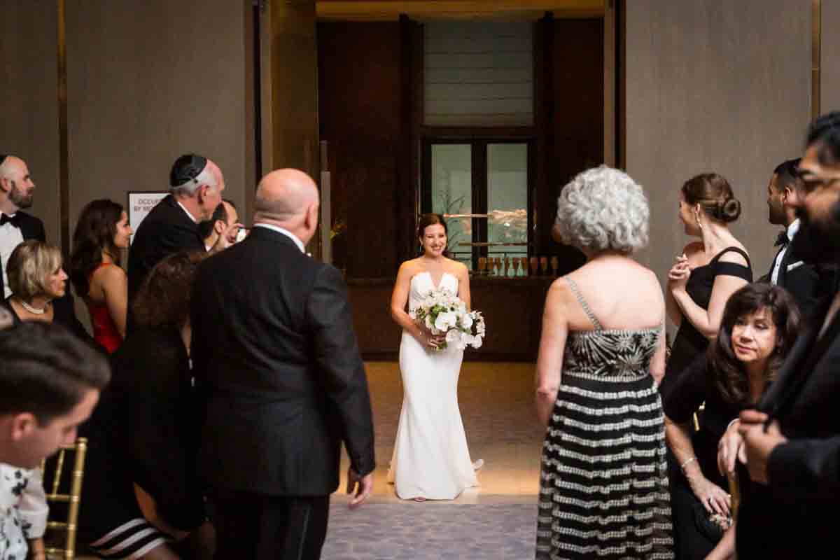 Bride about to walk down the aisle at a Four Seasons Hotel New York Downtown wedding