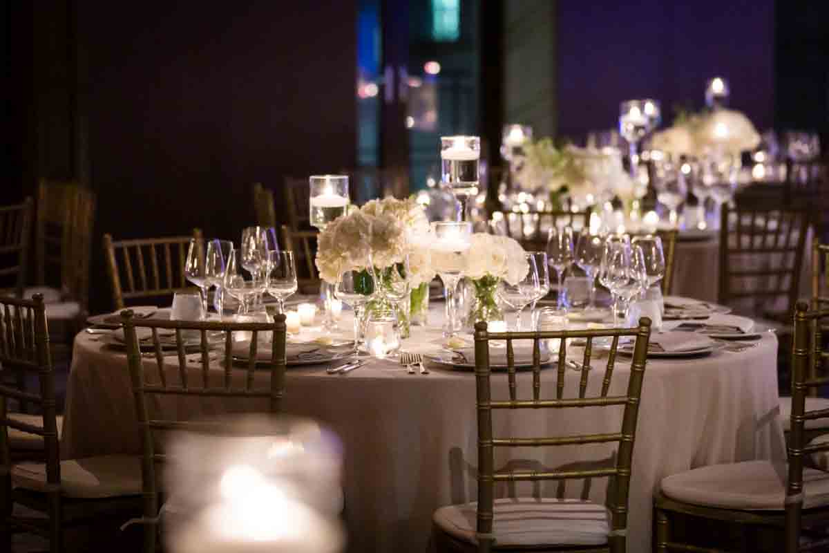 White flower centerpieces at a Four Seasons Hotel New York Downtown wedding
