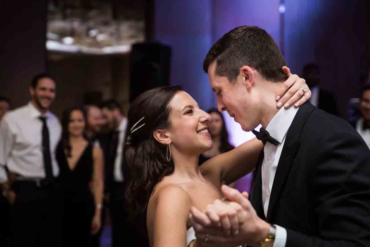 Bride and groom dancing during first dance at a Four Seasons Hotel New York Downtown wedding