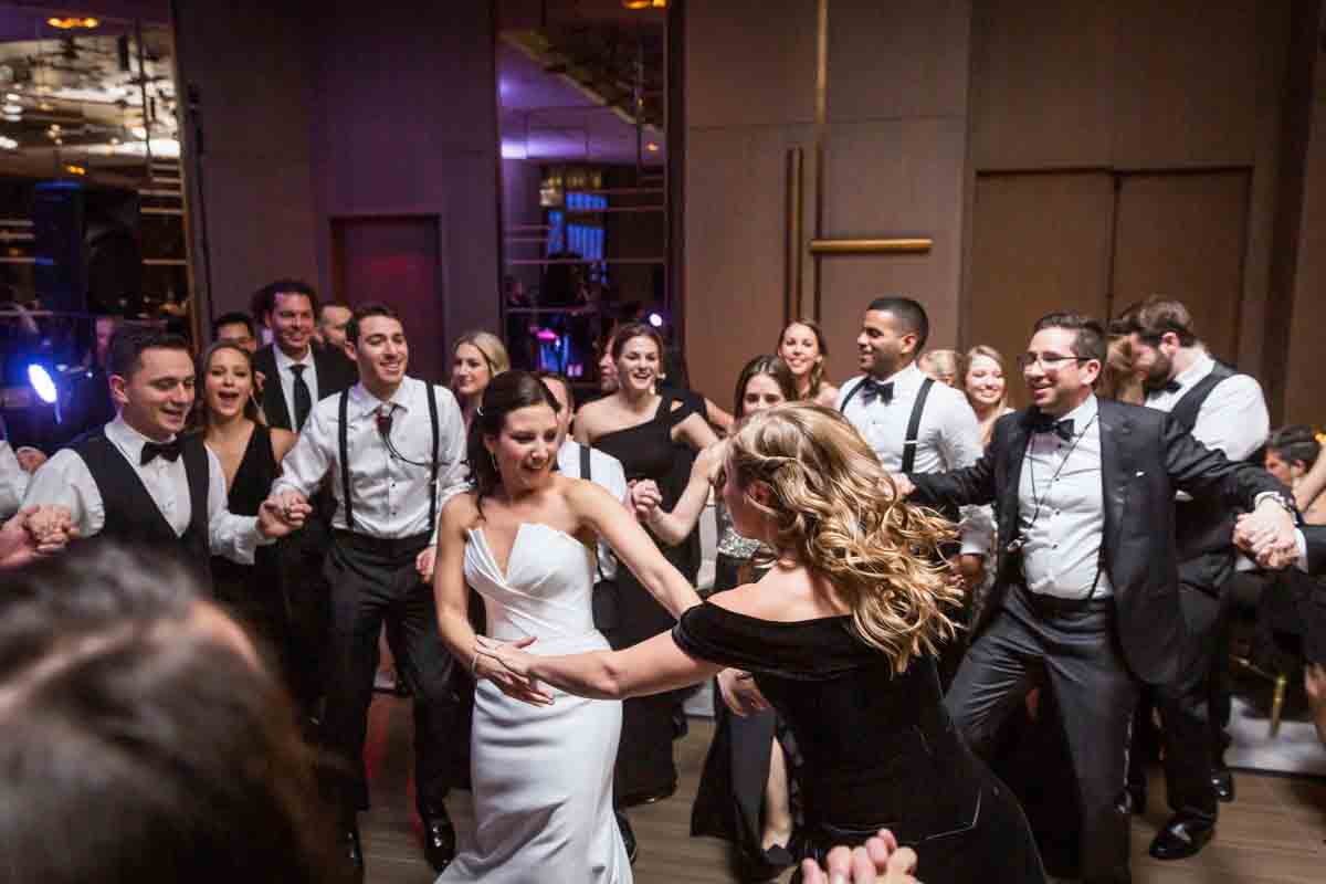 Bride and guests dancing during the hora at a Four Seasons Hotel New York Downtown wedding
