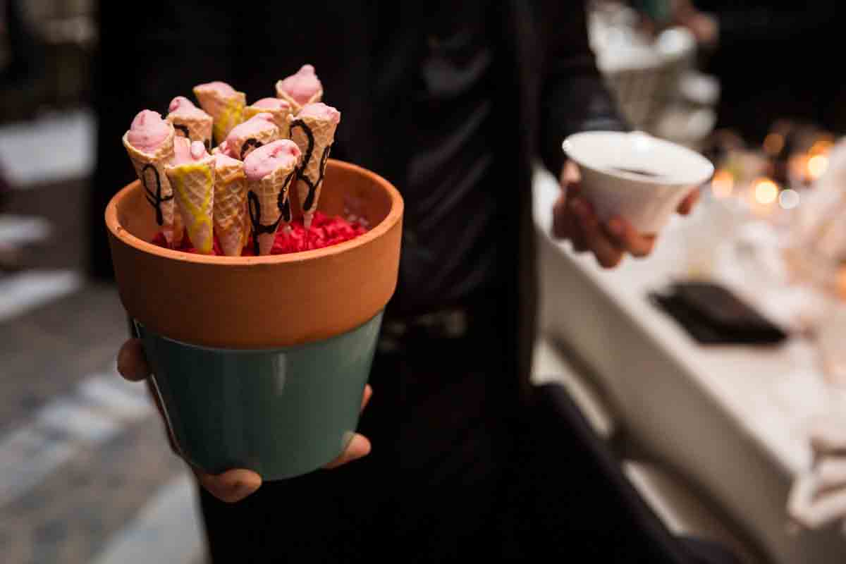 Tiny dessert ice cream cones served in terra cotta pots at a Four Seasons Hotel New York Downtown wedding