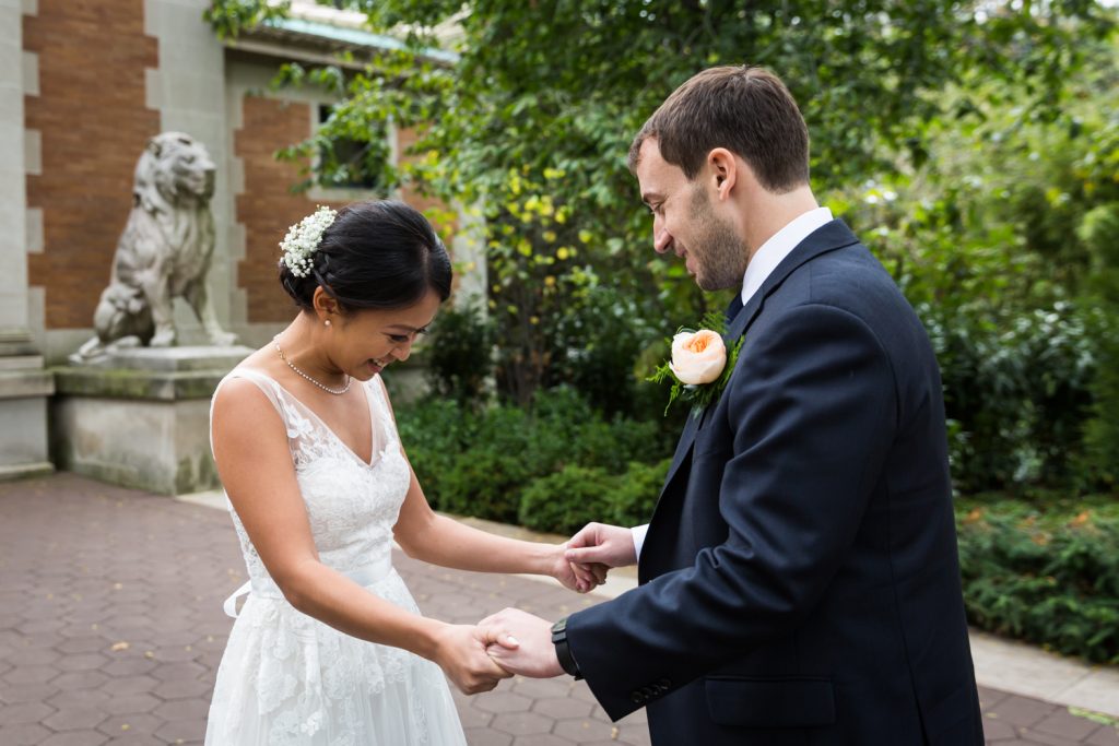 Bronx Zoo wedding photos of bride and groom during first look