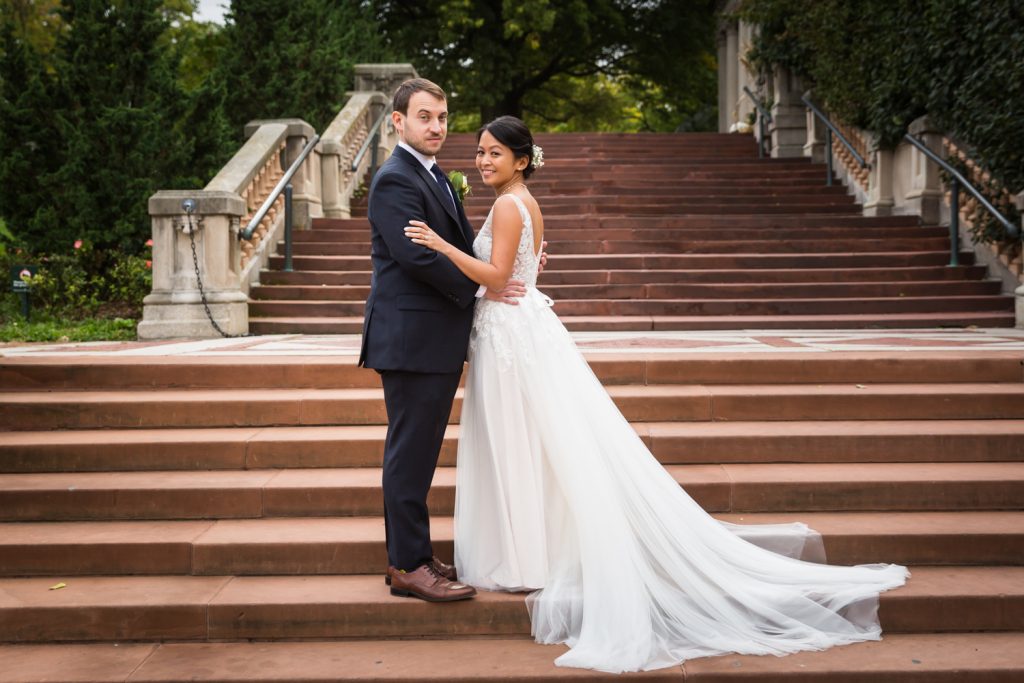 Bronx Zoo wedding photos of bride and groom on staircase