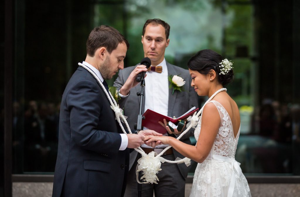 Filipino knot tying ceremony during Bronx Zoo wedding