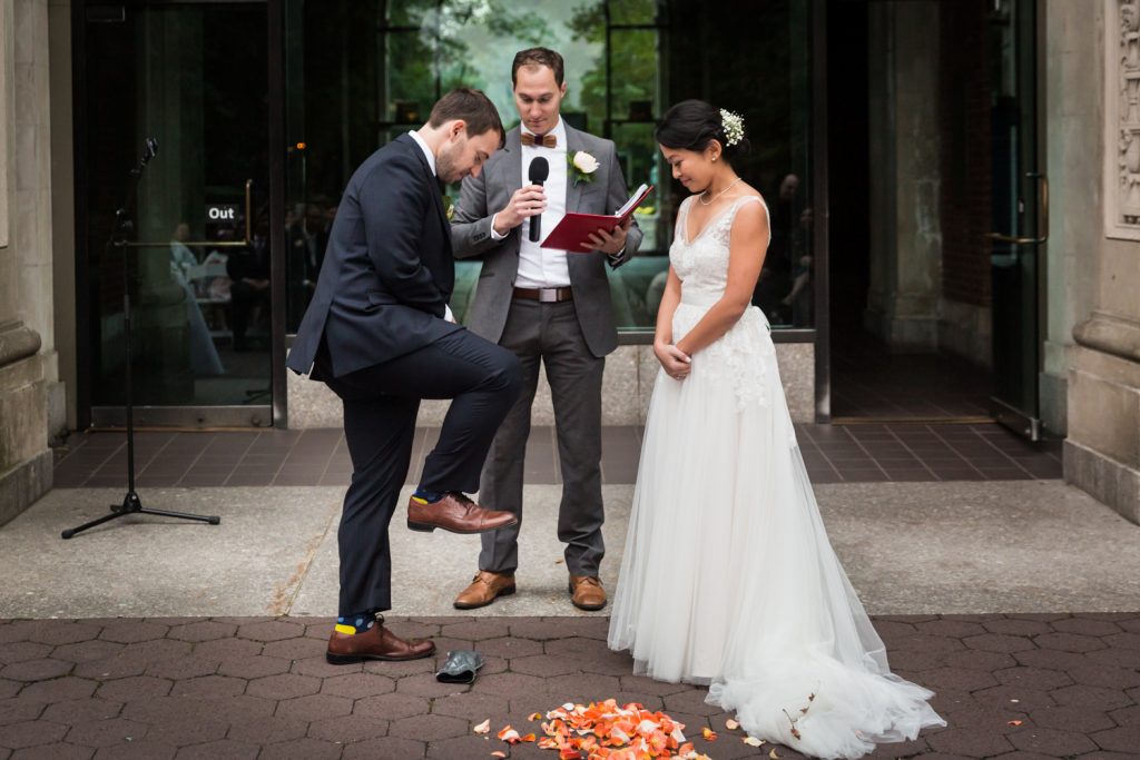 Groom about to smash glass during Bronx Zoo wedding ceremony