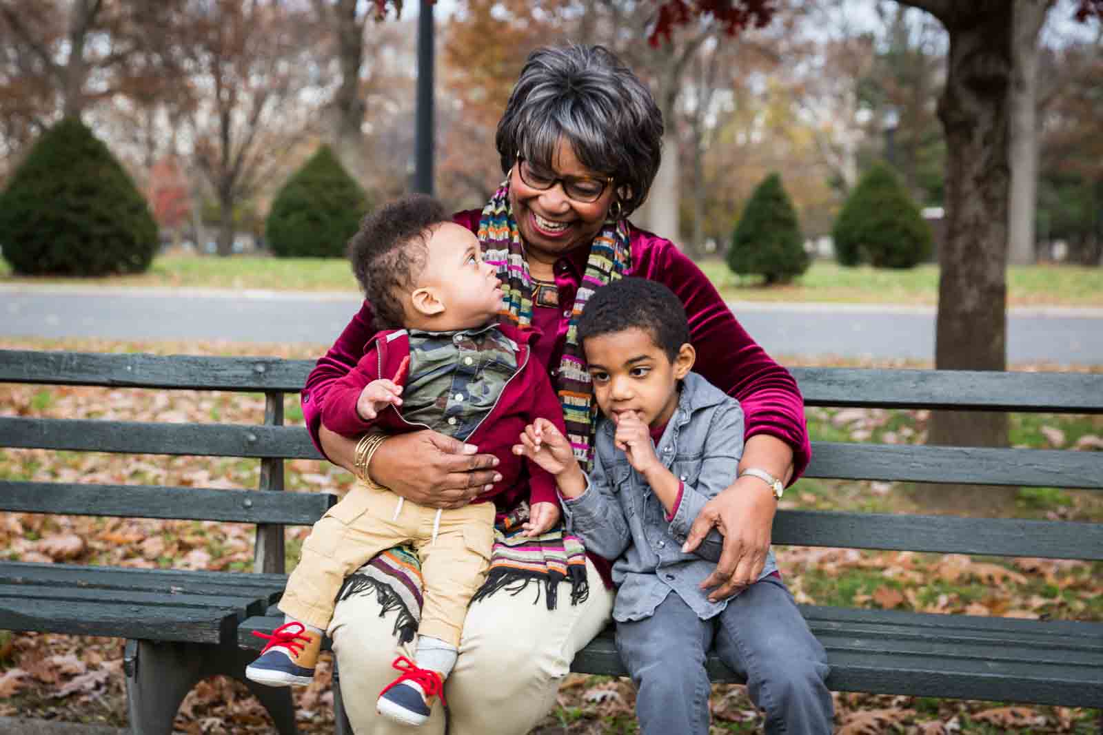 Flushing Meadows Corona Park family portrait of grandmother holding two grandchildren