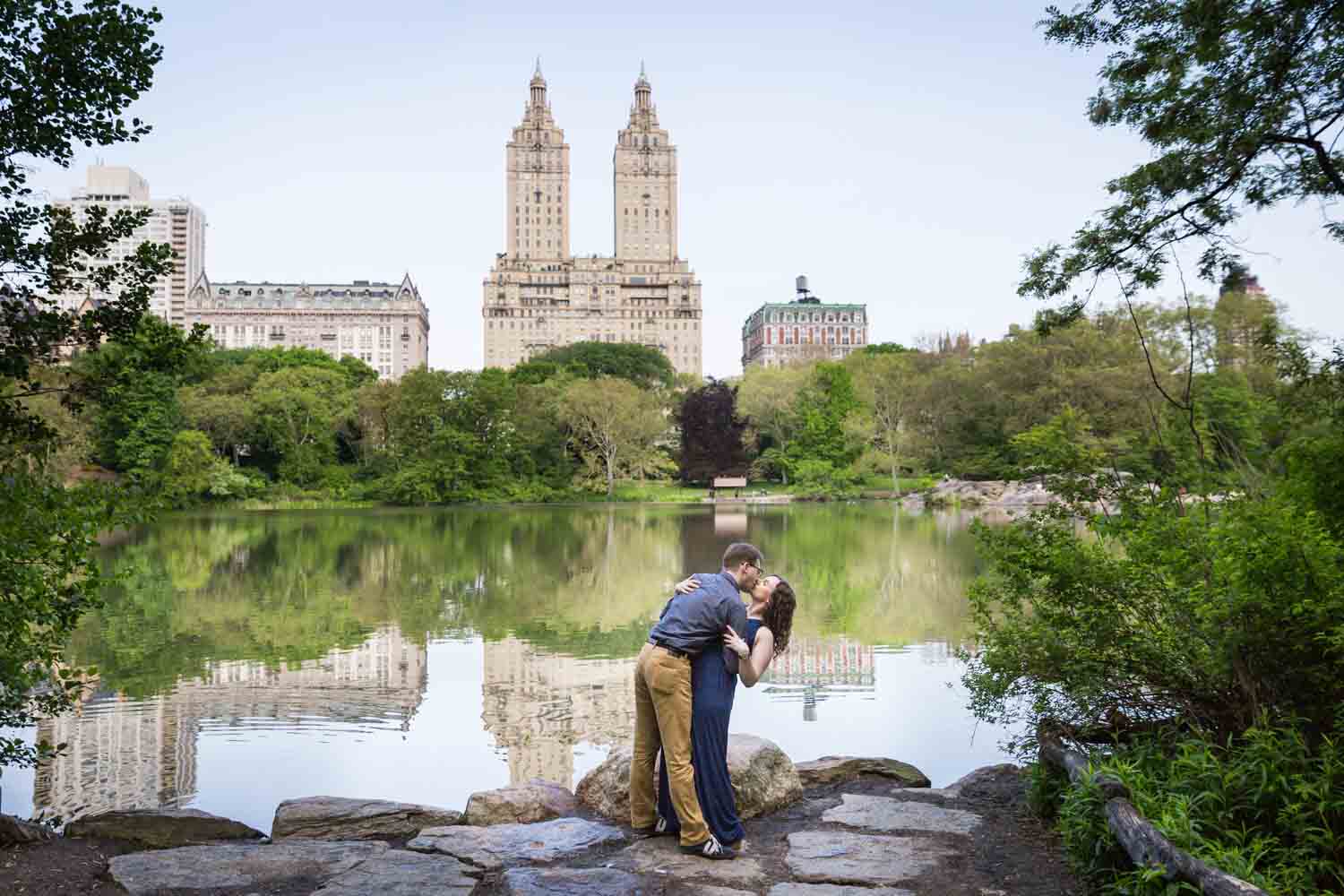 Couple dancing in Central Park lake viewing area