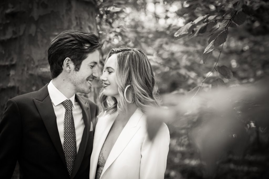 Black and white portrait of bride and groom for an article on how to modernize your wedding