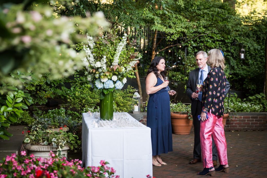 Guests in outdoor patio for an article on how to modernize your wedding