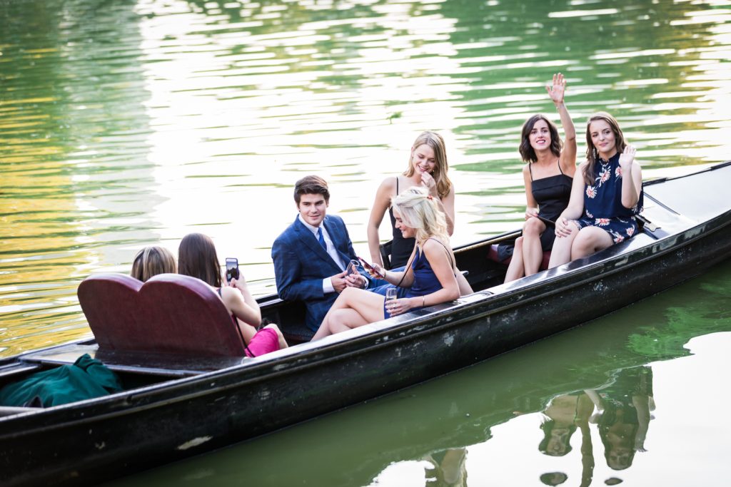 Guests on a gondola in Central Park lake