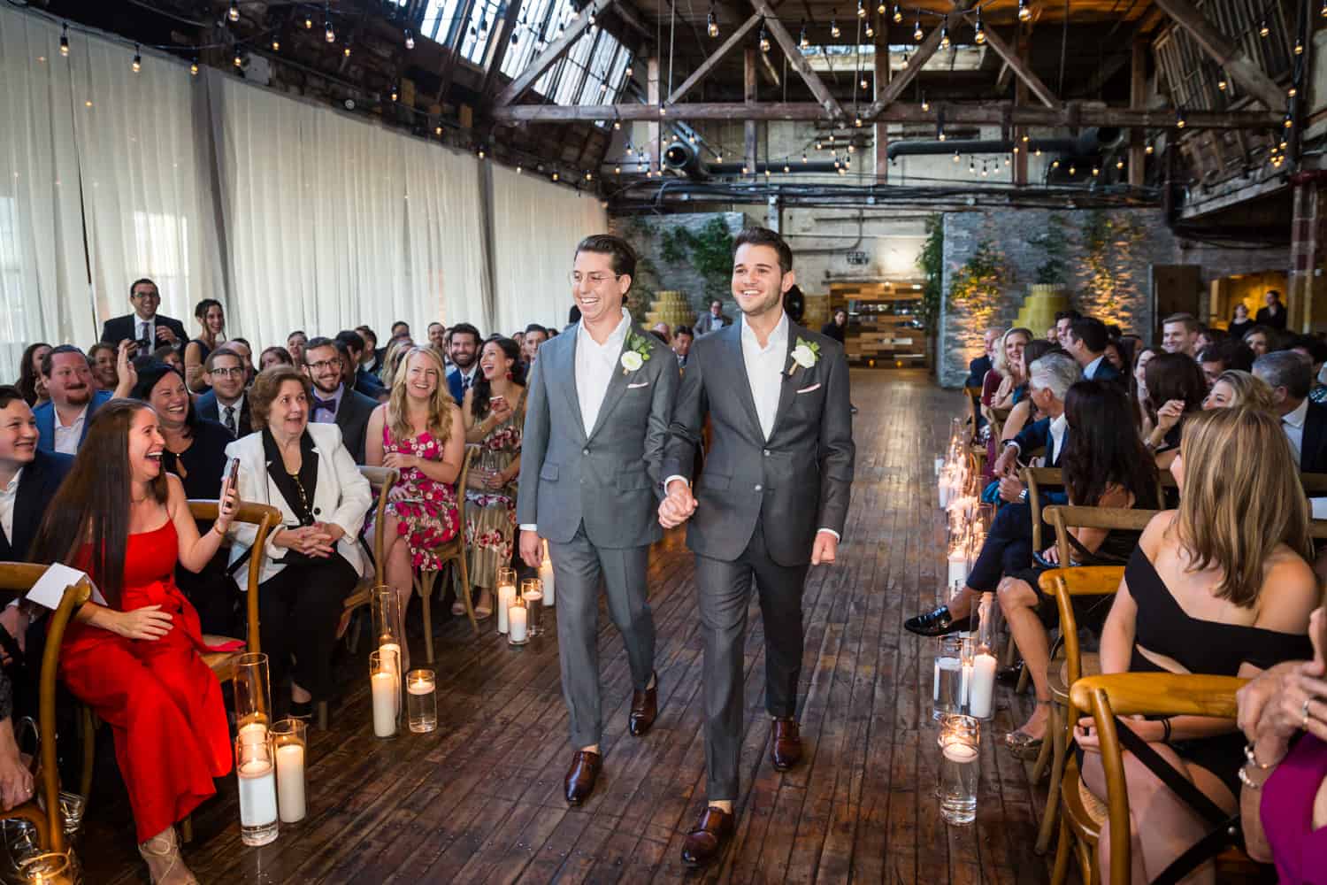 Greenpoint Loft wedding photos of two grooms walking down aisle